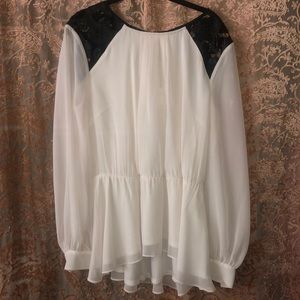 White blouse with black leather lace shoulders